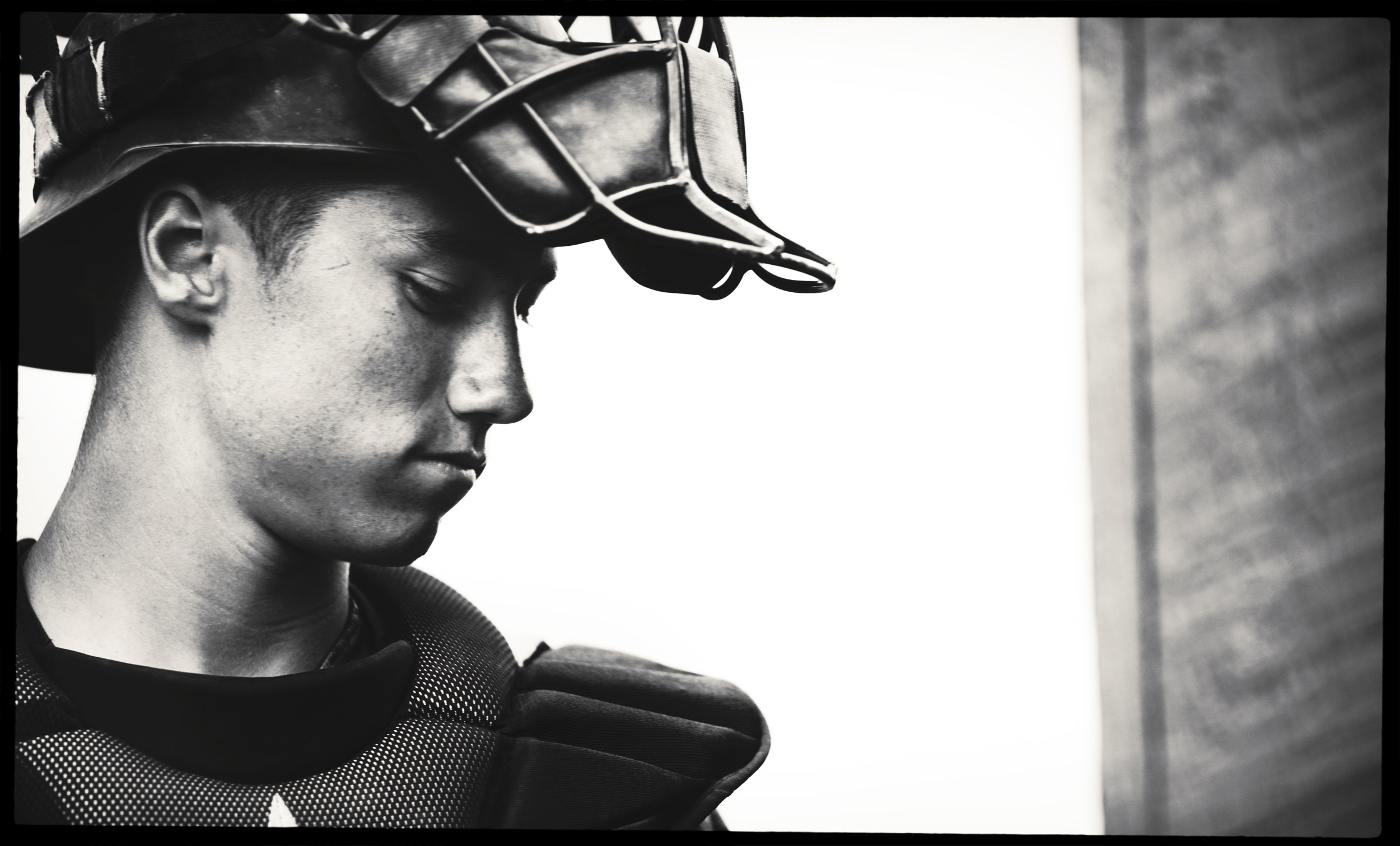 Portrait of a baseball catcher with his face mask