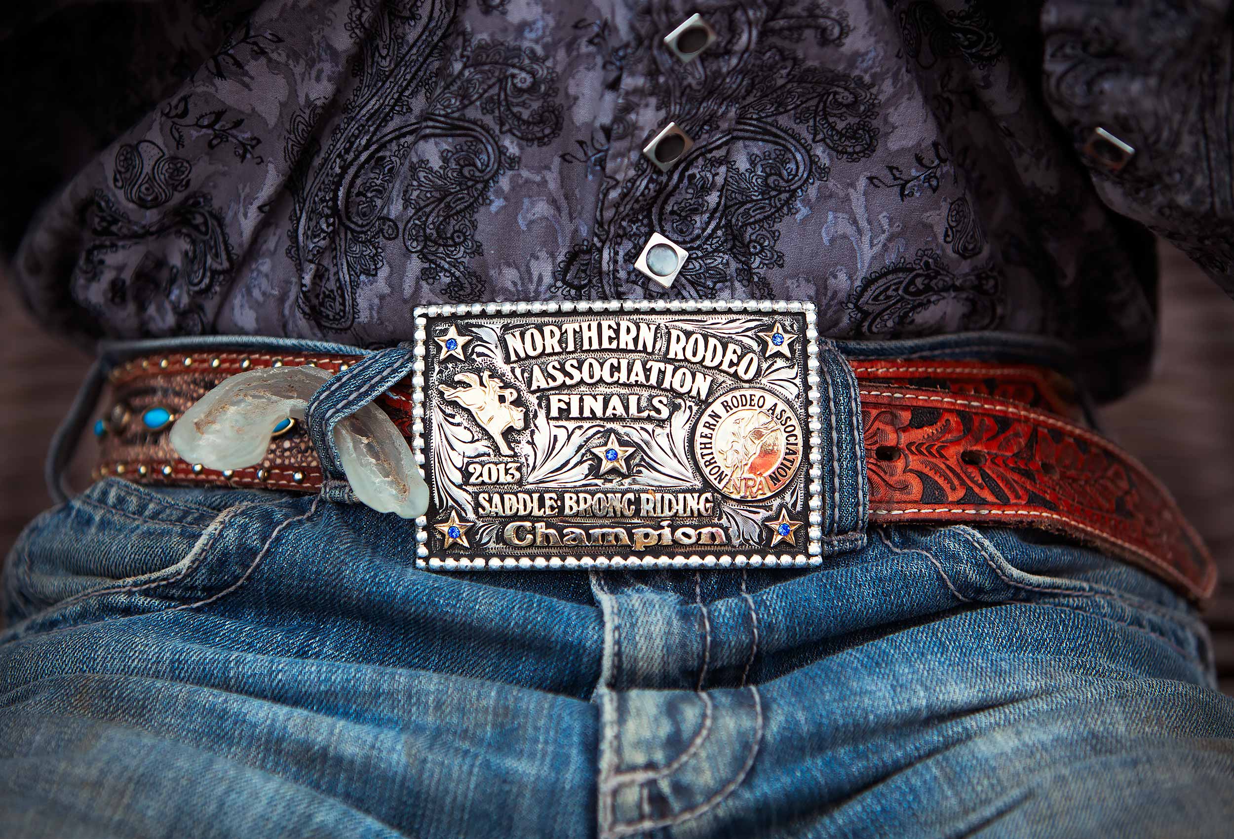 Cowboy with his rodeo belt buckle