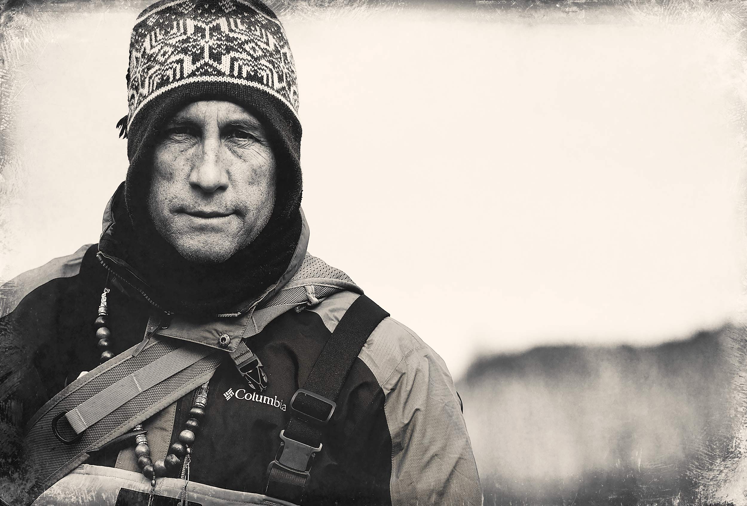 Portrait of a fly fisherman wearing winter clothing