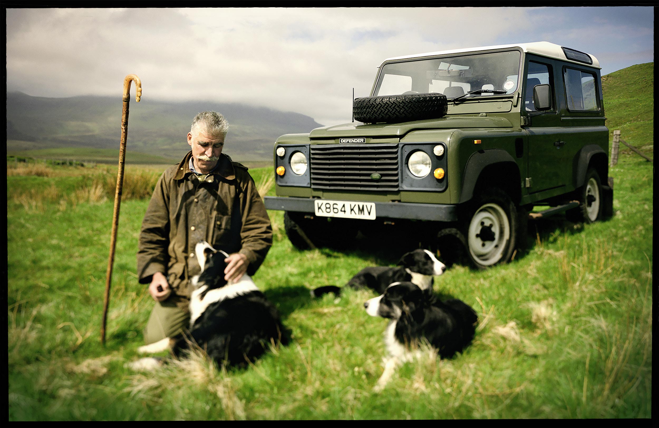 Scottish herdsman with his dogs on the Isle of Skye