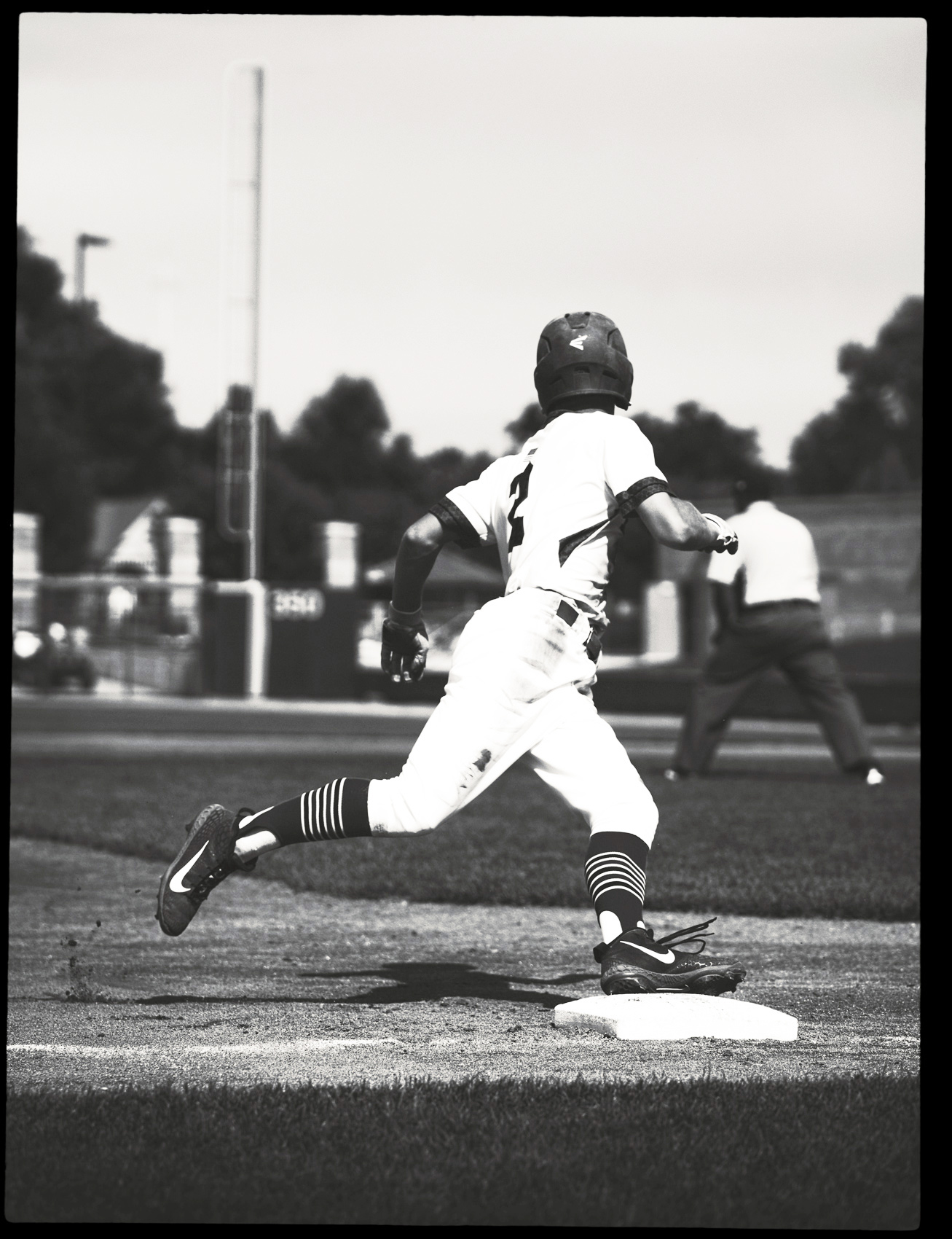 Baseball player rounding third