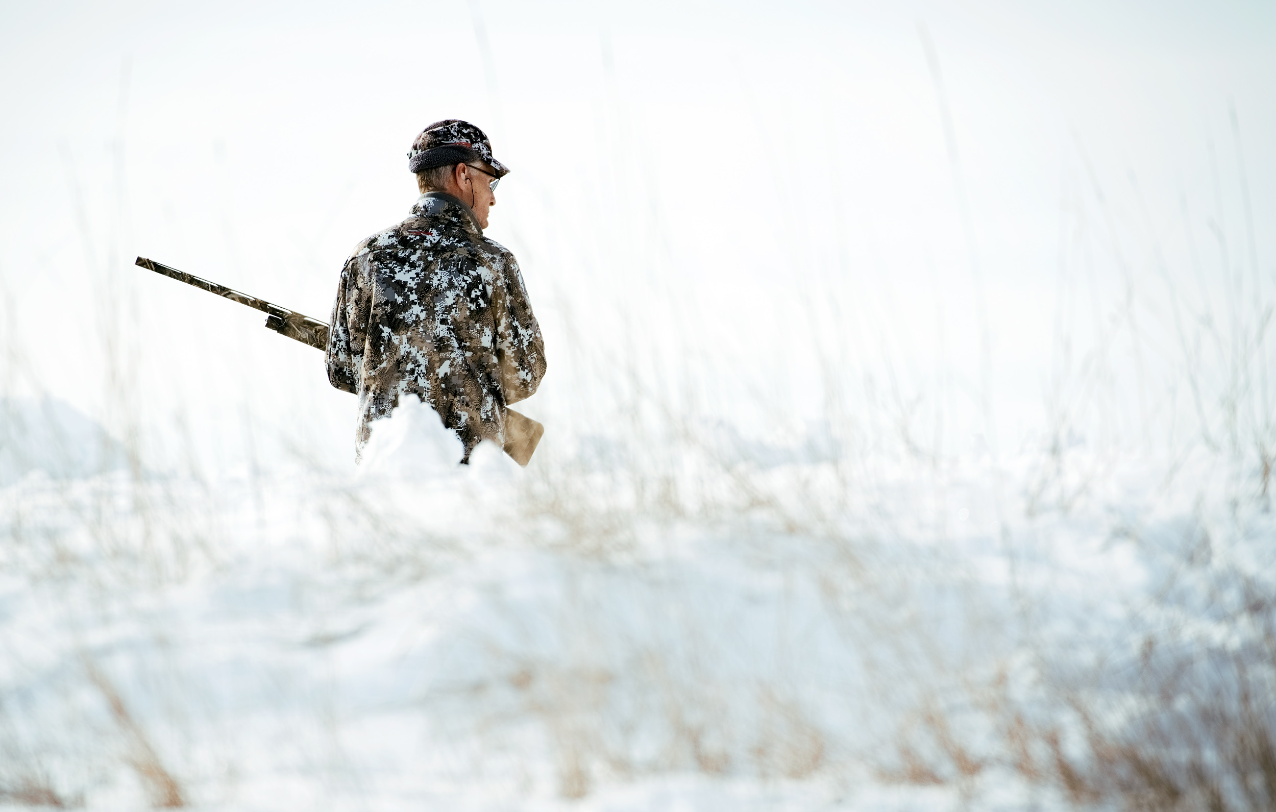 Montana Pheasant Hunter in the Snow