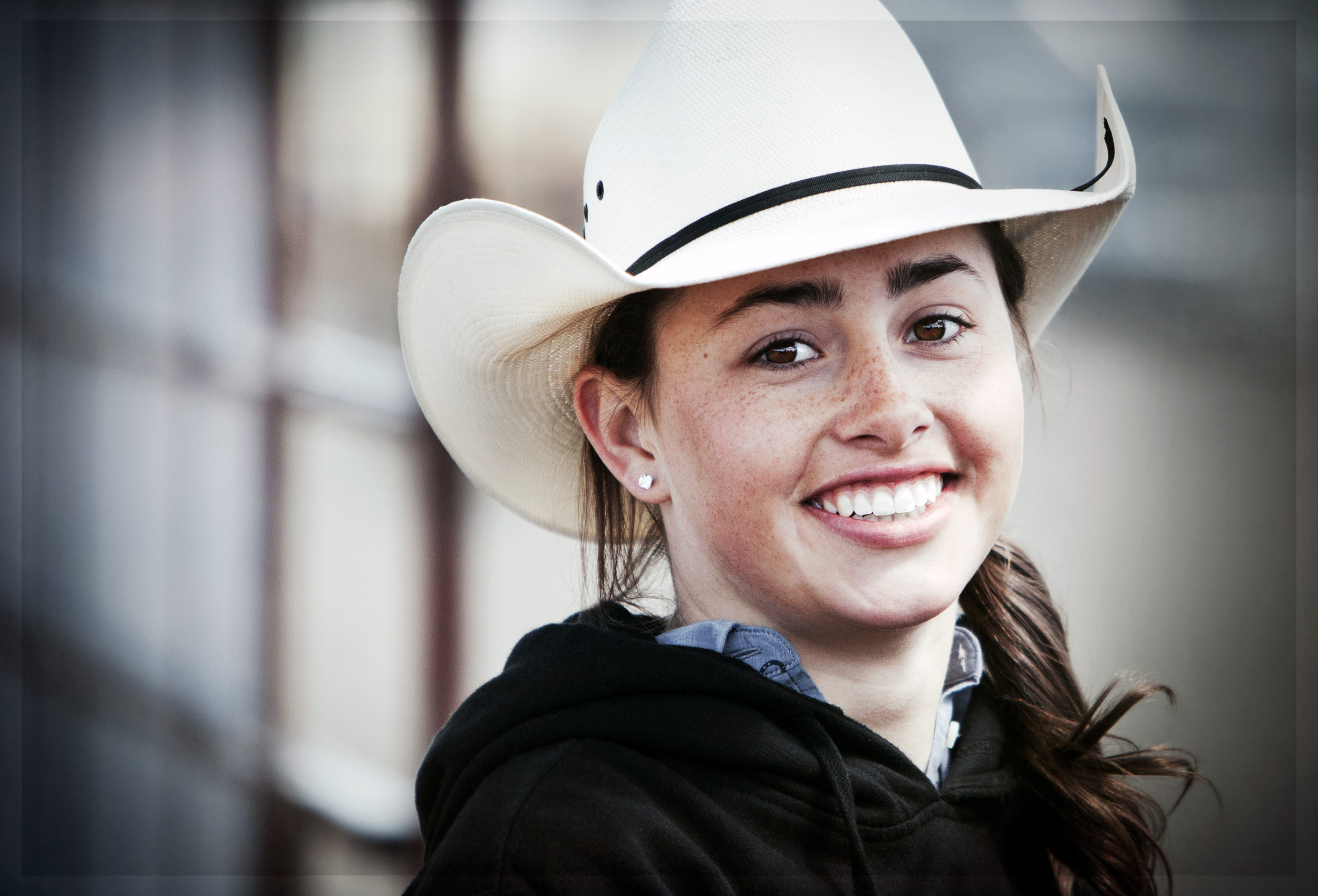 Cowgirl smiling at a rodeo in Three Forks, Montana